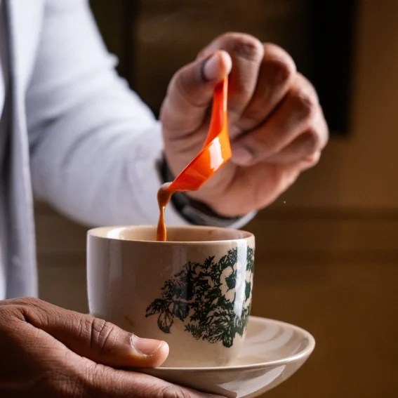 Traditional Malaysian kopi being served